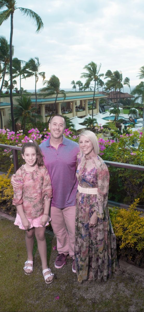 Dr. Cummings with their family on the beach